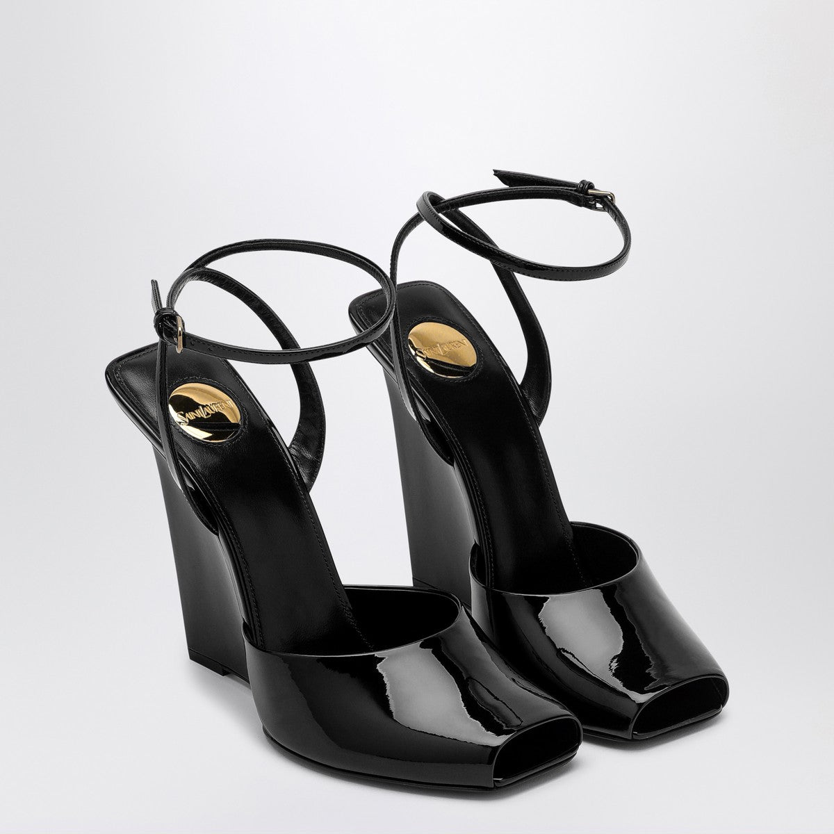 Saint Laurent La Scandale wedge in black patent leather